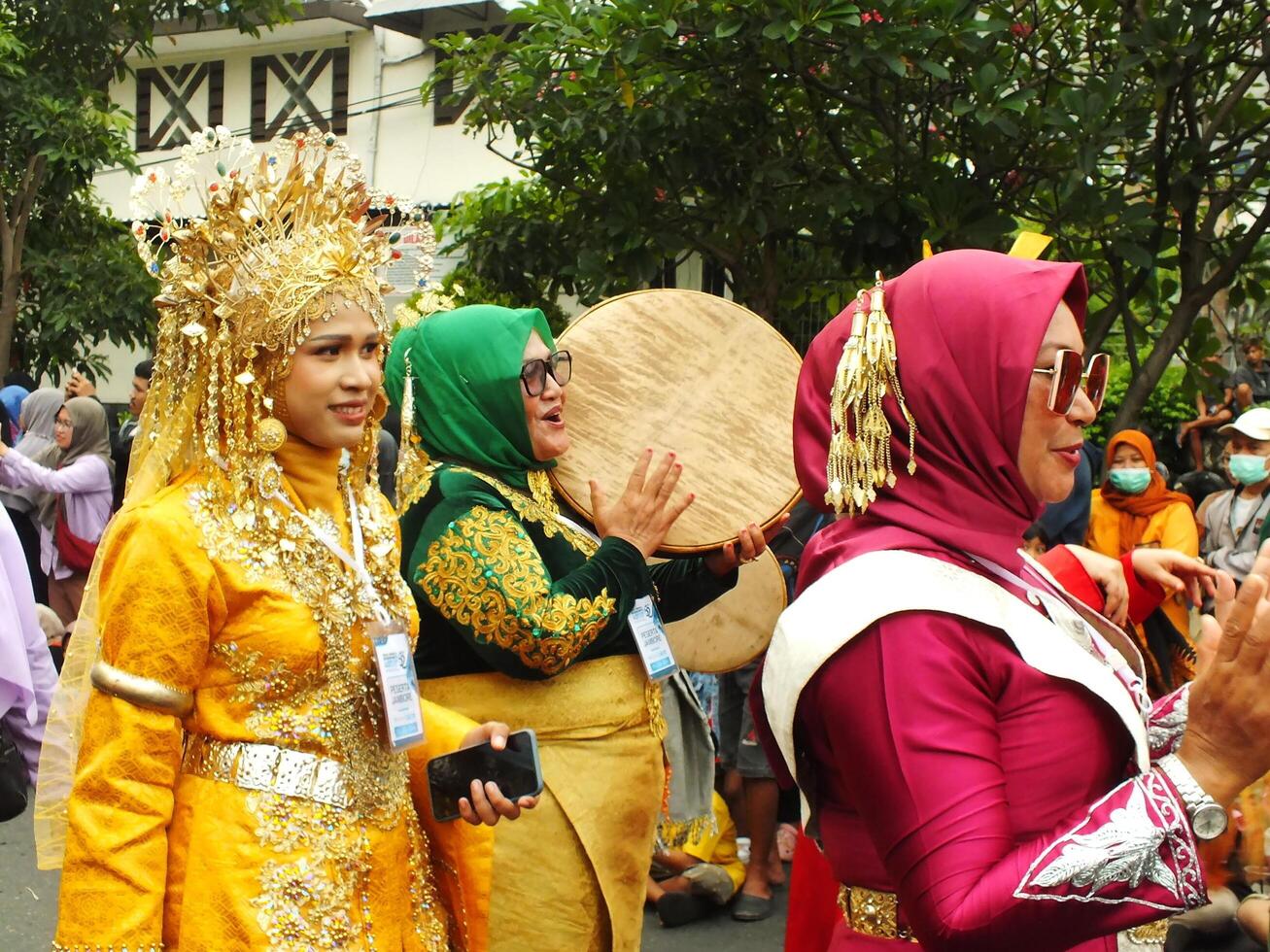 Surakarta City, Central Java, Indonesia, May 15, 2024. Tourist attraction on a traditional costume parade at Slamet Riyadi Street. photo