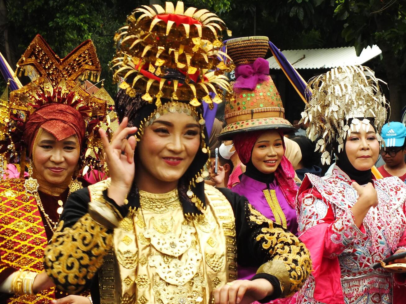 Surakarta City, Central Java, Indonesia, May 15, 2024. Tourist attraction on a traditional costume parade at Slamet Riyadi Street. photo