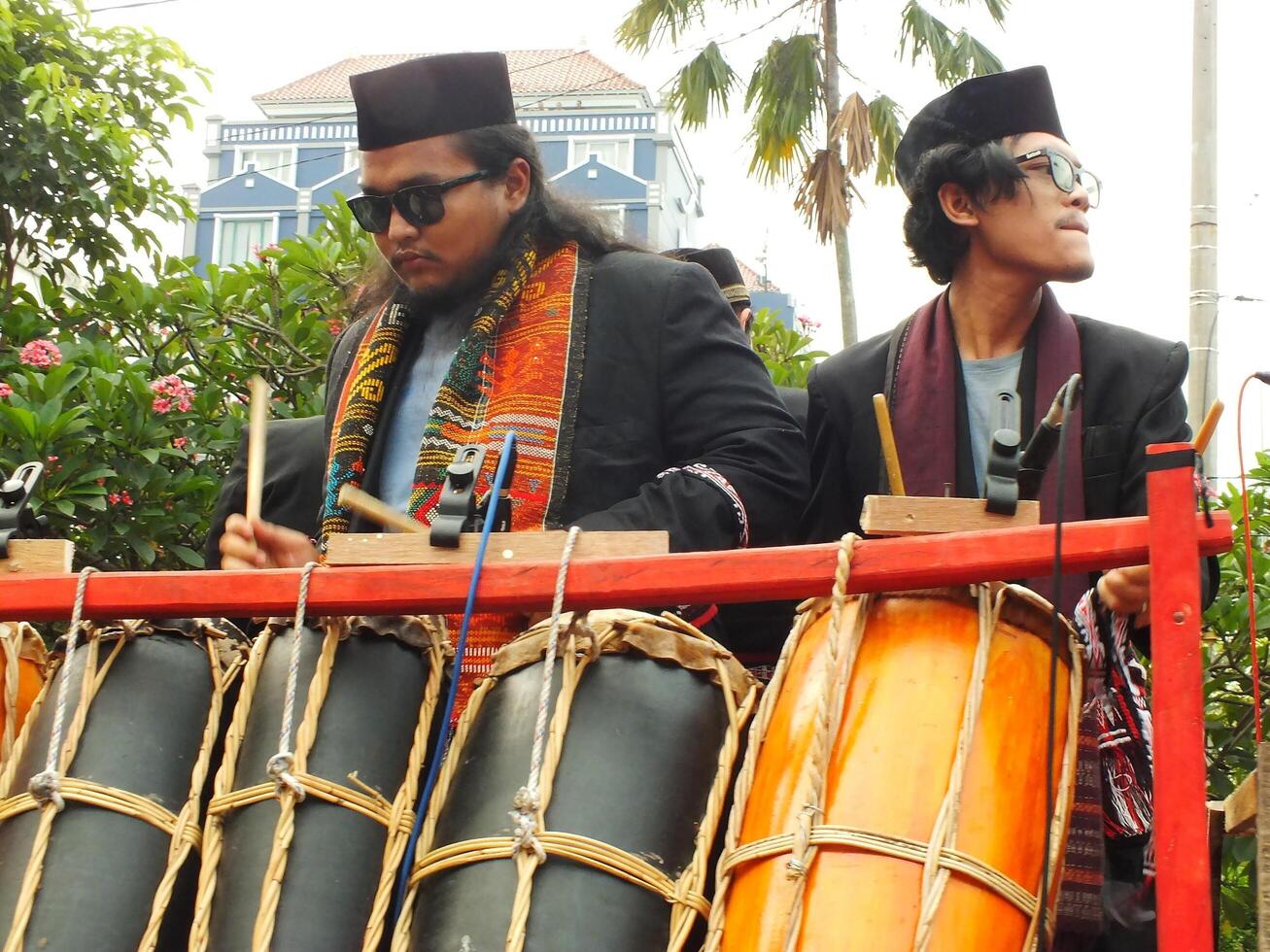 Surakarta City, Central Java, Indonesia, May 15, 2024. Tourist attraction on a traditional costume parade at Slamet Riyadi Street. photo