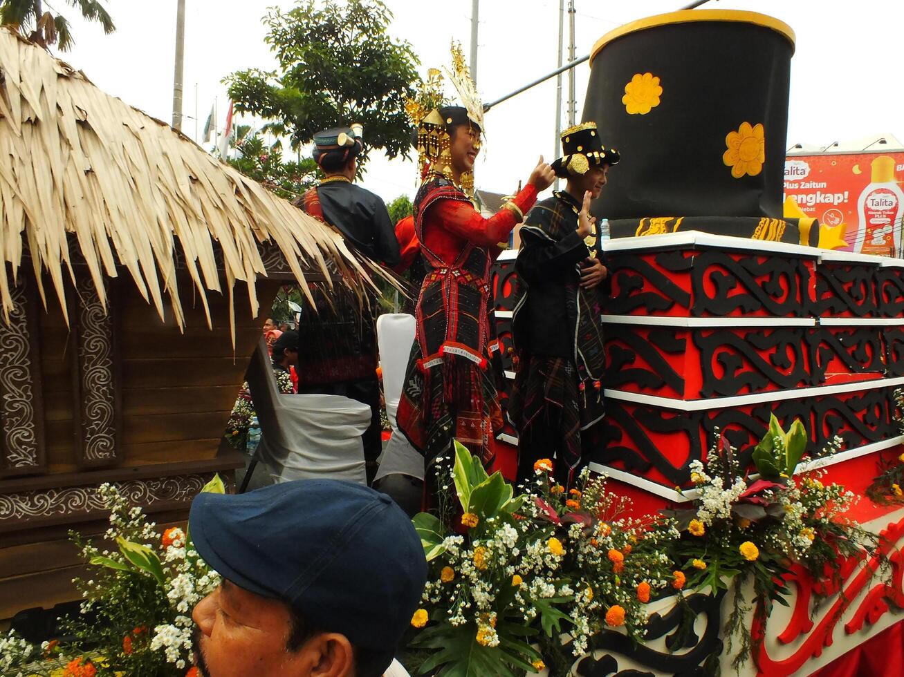 Surakarta City, Central Java, Indonesia, May 15, 2024. Tourist attraction on a traditional costume parade at Slamet Riyadi Street. photo
