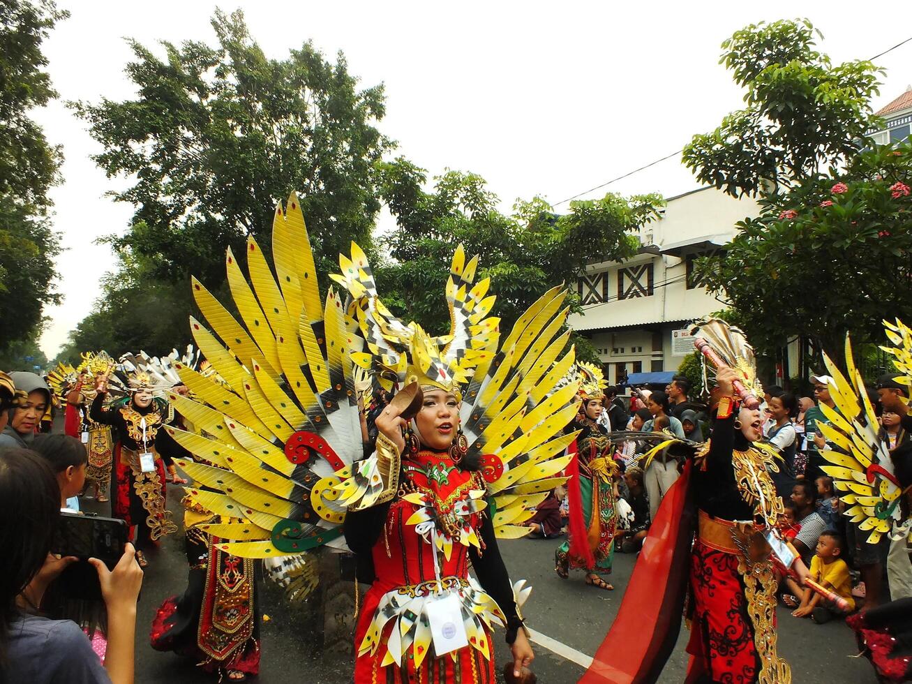 Surakarta City, Central Java, Indonesia, May 15, 2024. Tourist attraction on a traditional costume parade at Slamet Riyadi Street. photo