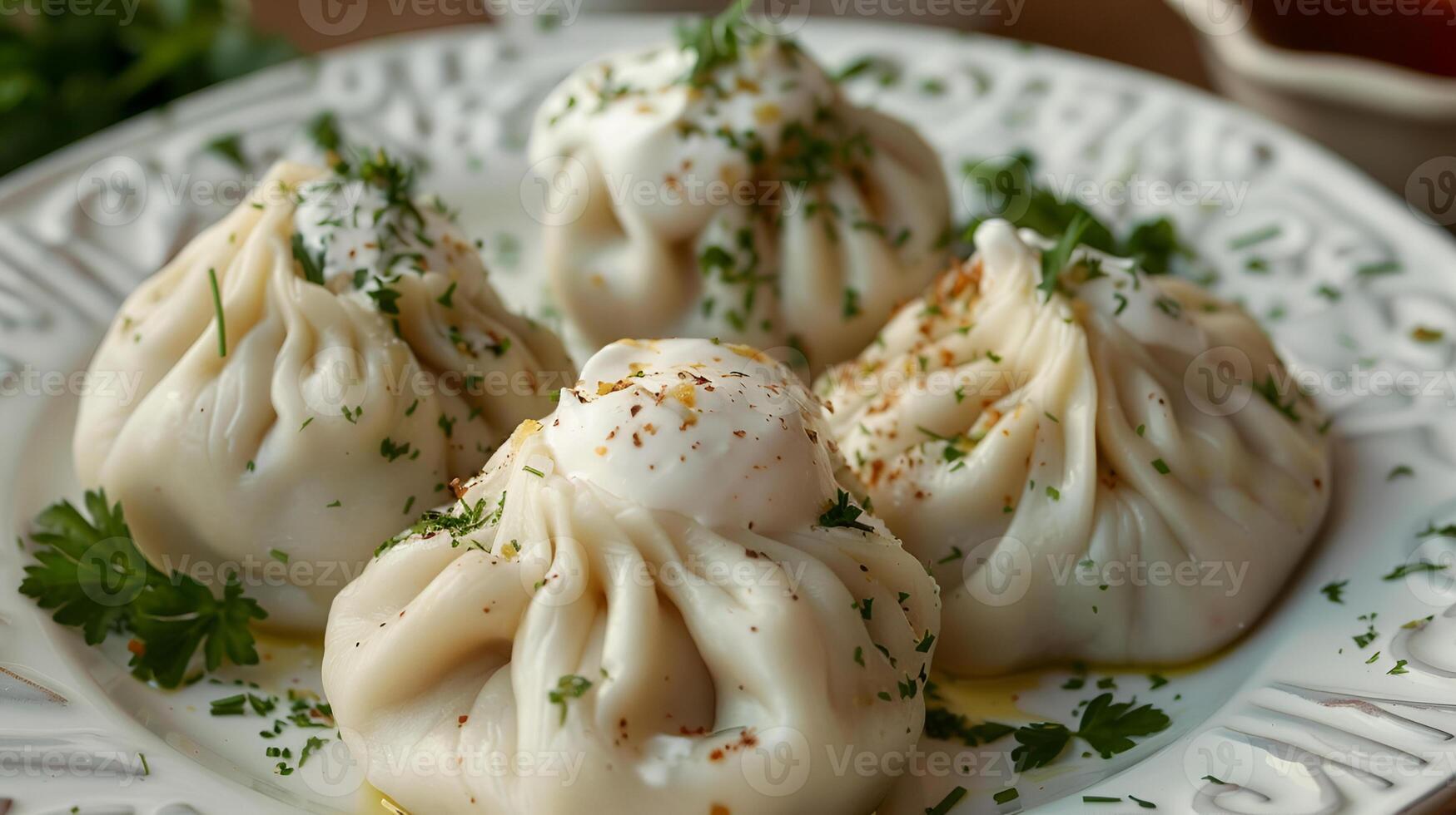appetizing khinkali dumplings with herbs photo