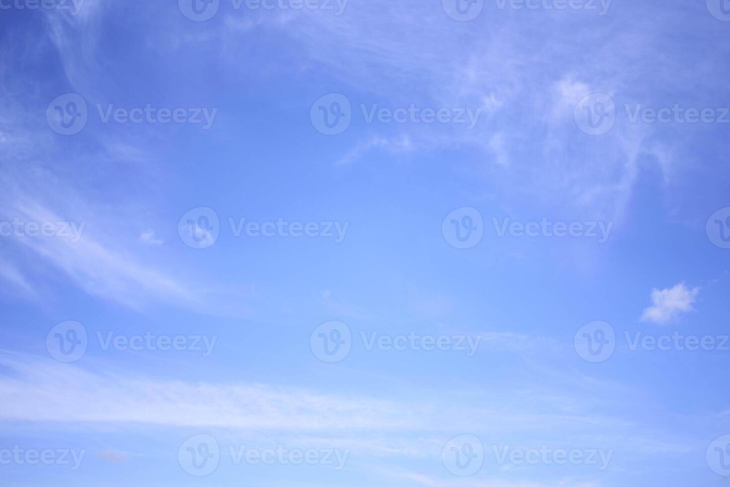 the sky on a summer day with white cirrus clouds photo