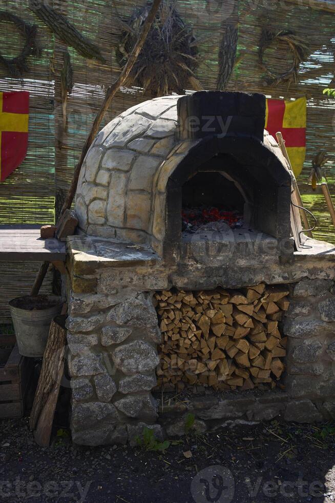old wood-burning stove to learn about traditional crafts photo