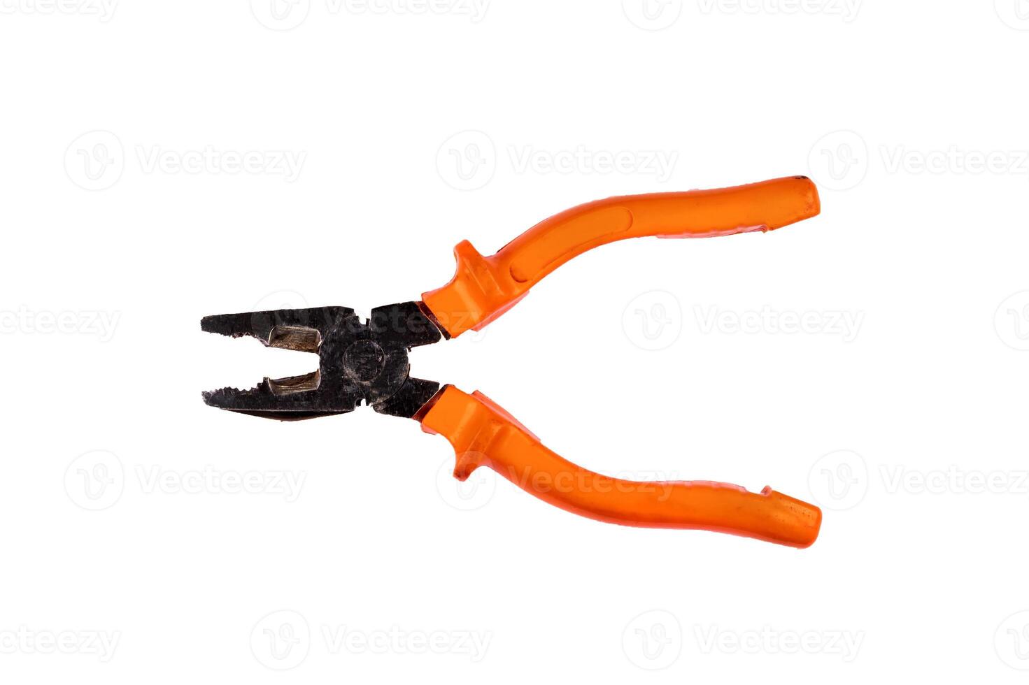 Used pliers with orange rubber handles, isolated on white background photo