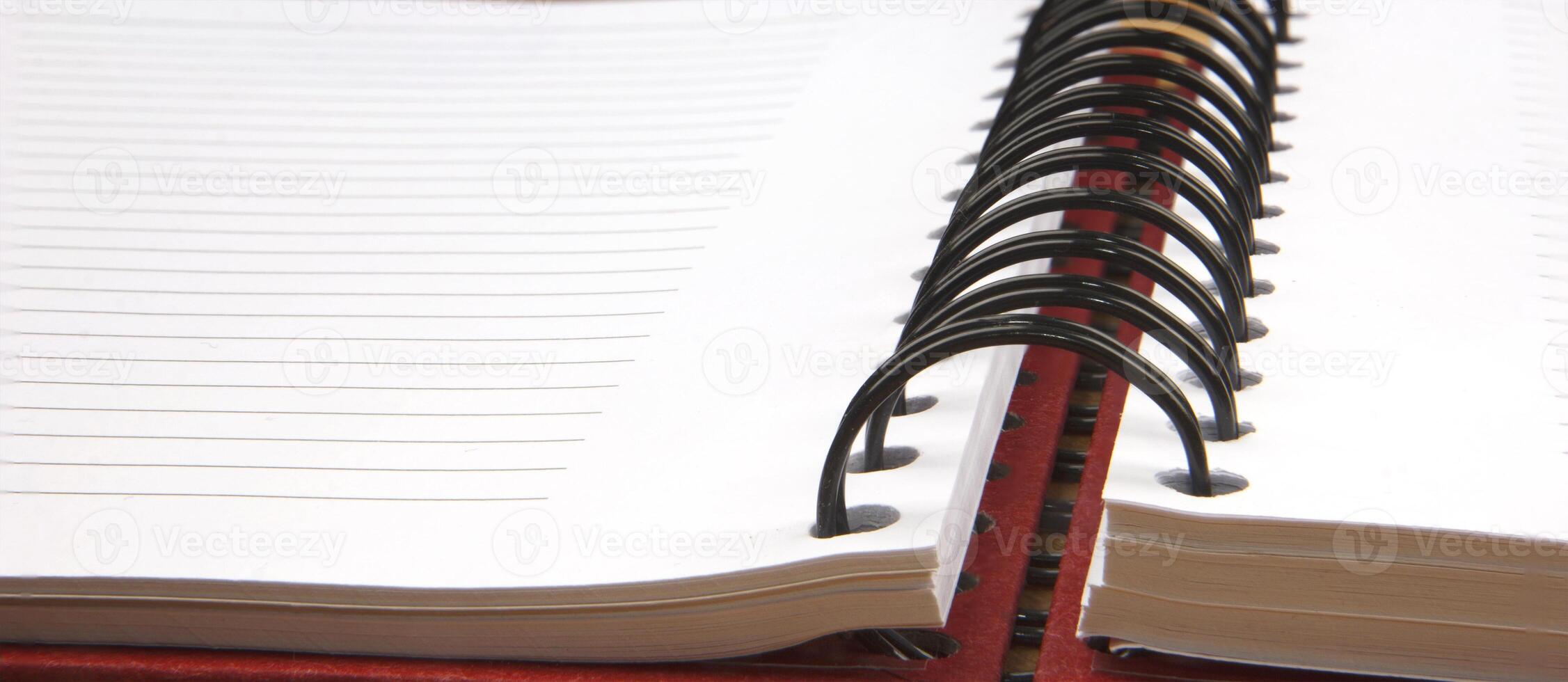 Close up of an open spiral notebook. Banner view photo