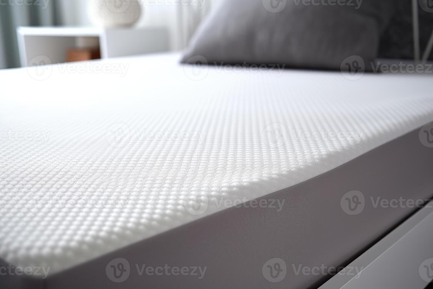 White memory foam mattress topper on bed photo