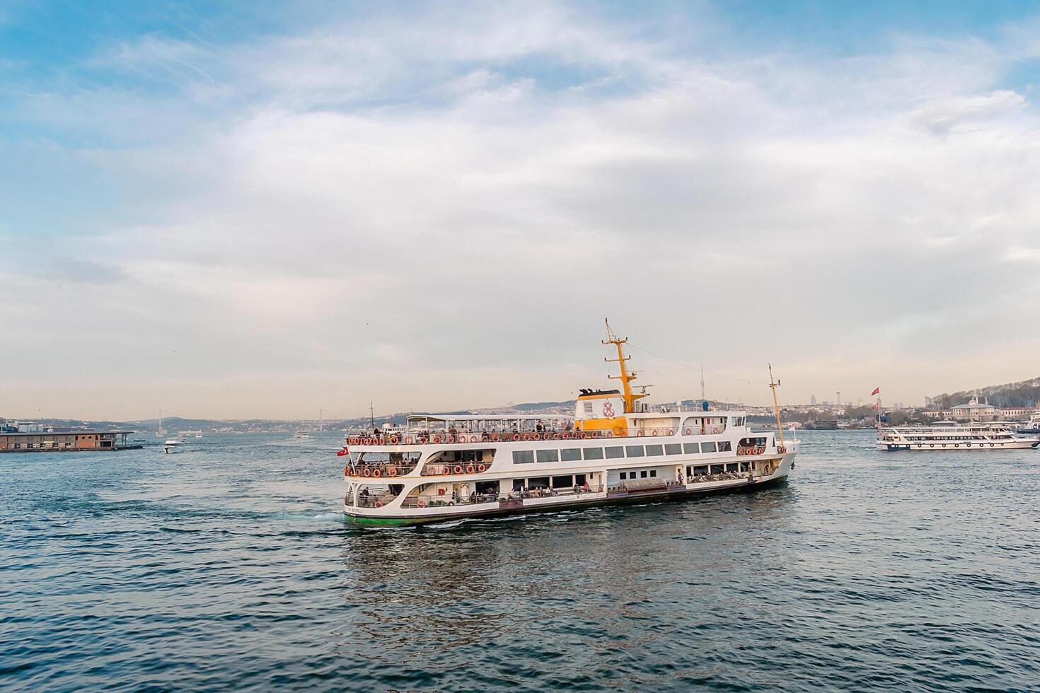 Traffic in the waters of the Bosphorus. Regular traffic of various watercraft from the port in Istanbul. photo