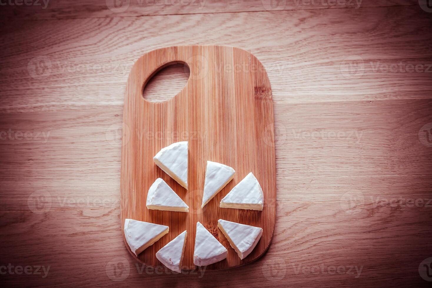 Camembert on the wooden board photo