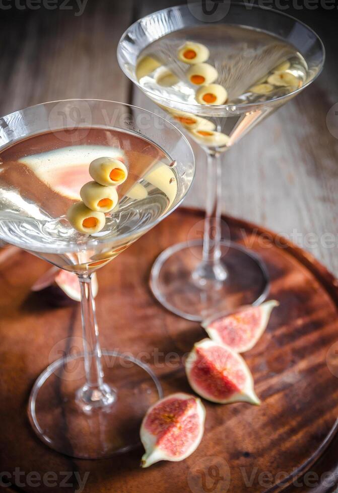 Two olive martini cocktails photo