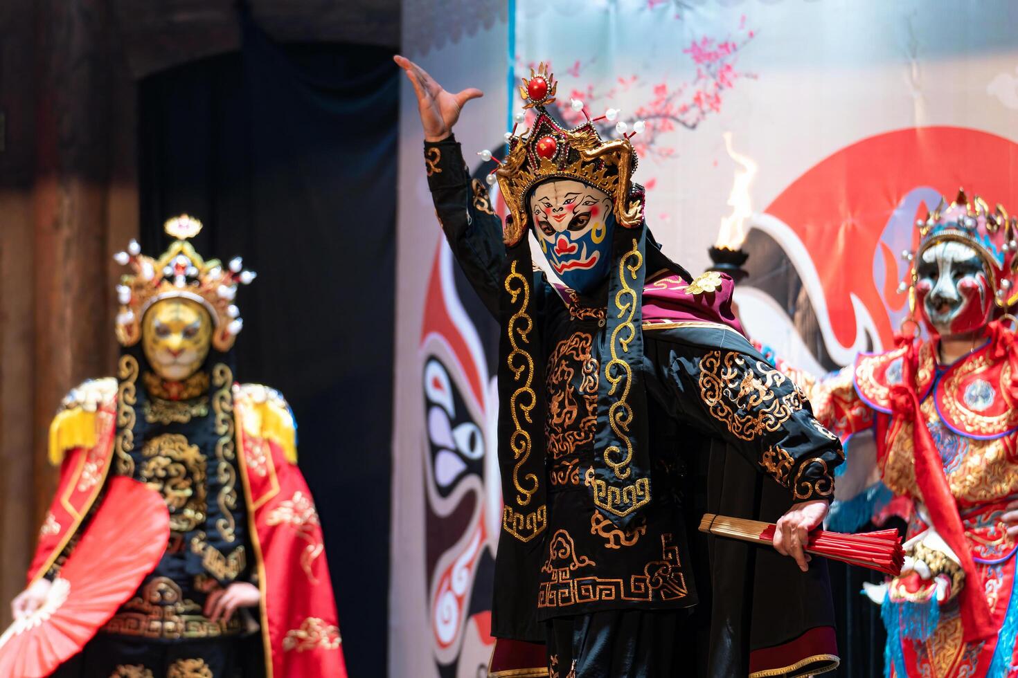 CHENGDU, CHINA - MAY 10, 2024 -Chinese actor performs a public traditional changing face performance onstage in Chengdu, China photo