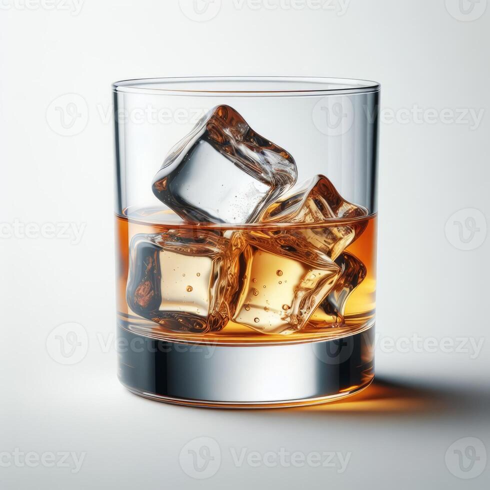 Close-up of whiskey with ice cubes in a clear glass photo