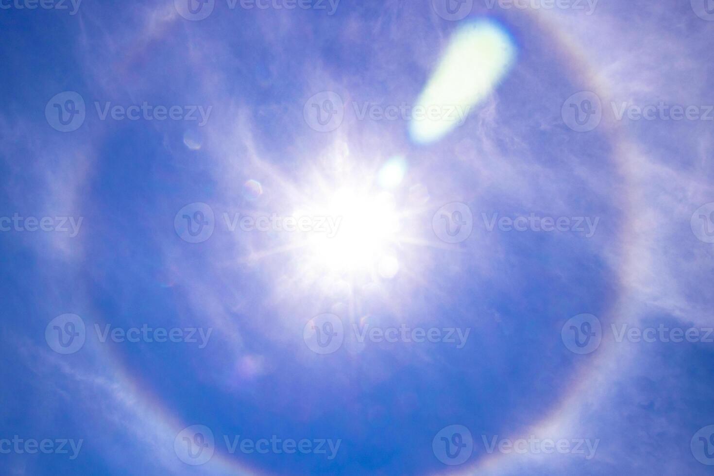 Rainbow circle around the sun in the sky Bentota Beach Sri Lanka. photo