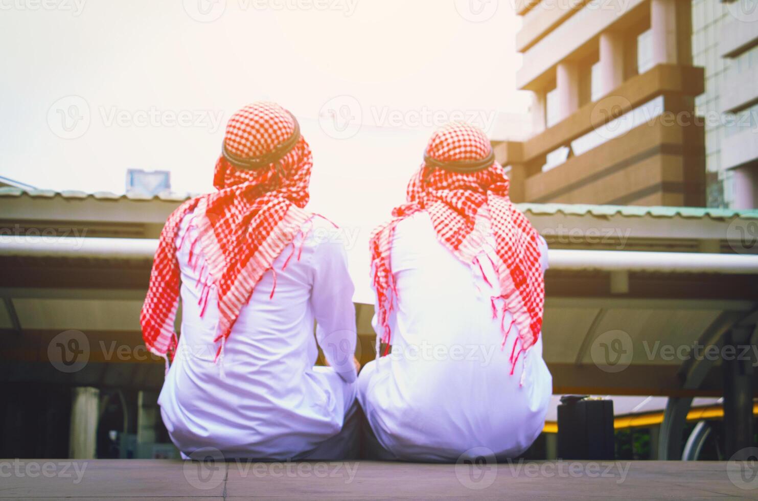 In town.Muslim Arab engineer man.They are talking about plant ,exchange information and Targeting . Photo concept with Arab engineer.