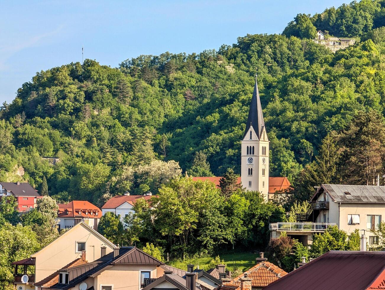 Beautiful hillside cityscape, St Nicholas Parish Church in Krapina, Croatia, Hrvatsko zagorje, buildings and architecture background, wallpaper photo