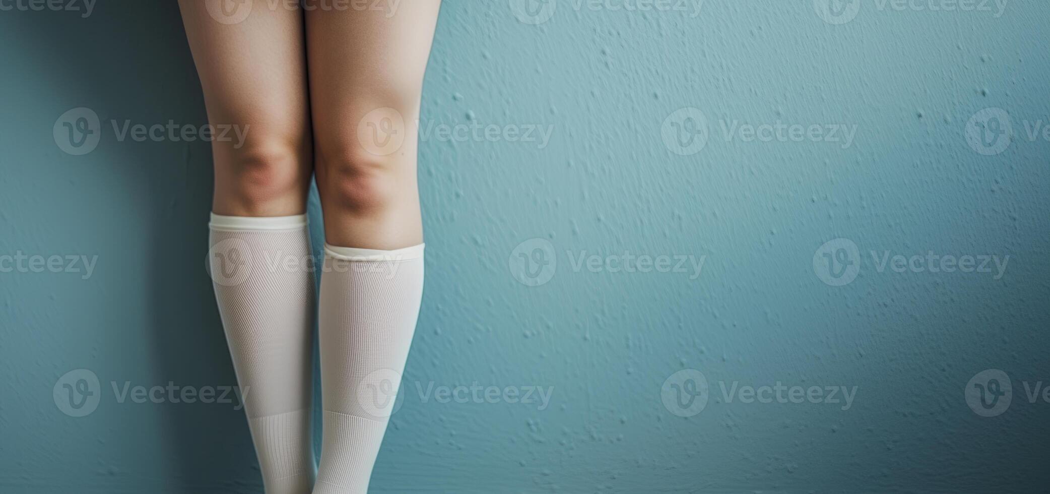Child, girl, woman, person show legs, feet. Skin, body closeup, beauty. Young kid, baby, barefoot. photo