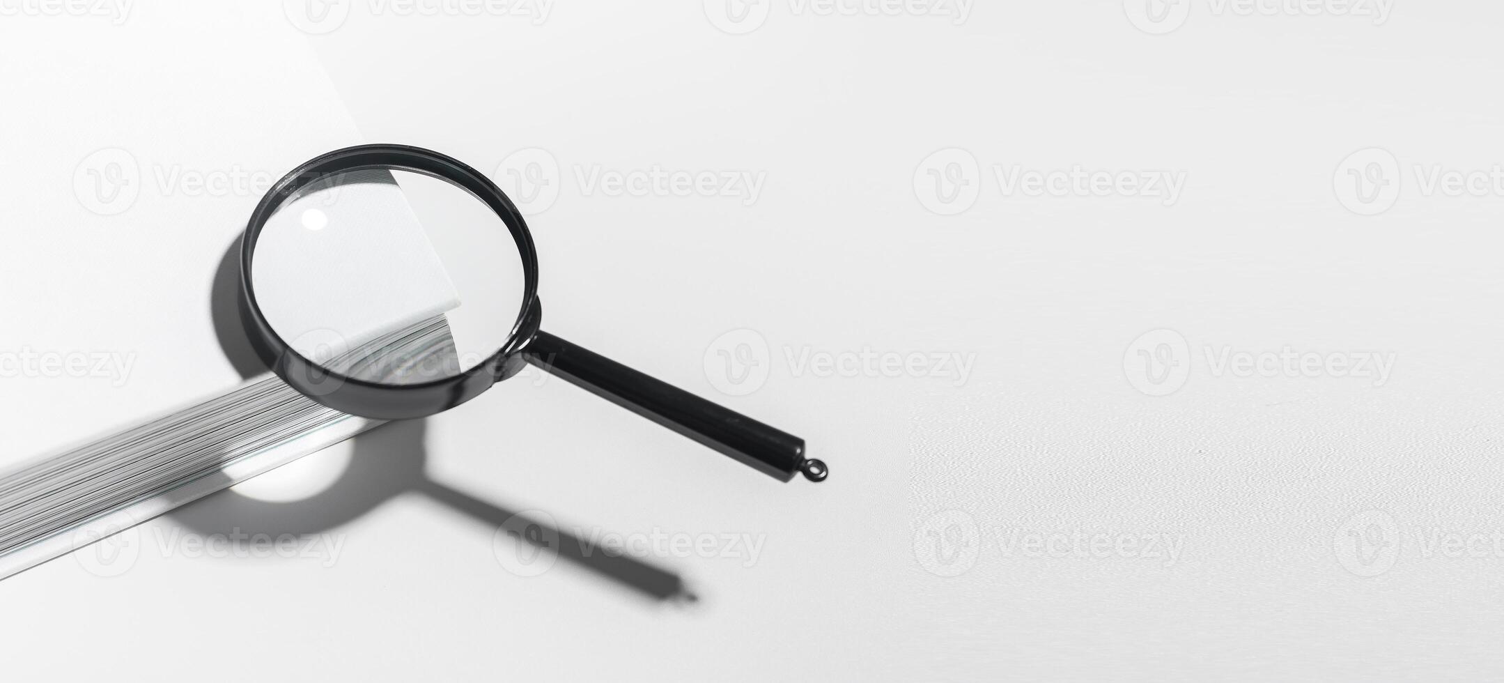 Exploration and research with magnifying glass. Single lens for discovery, search magnification photo