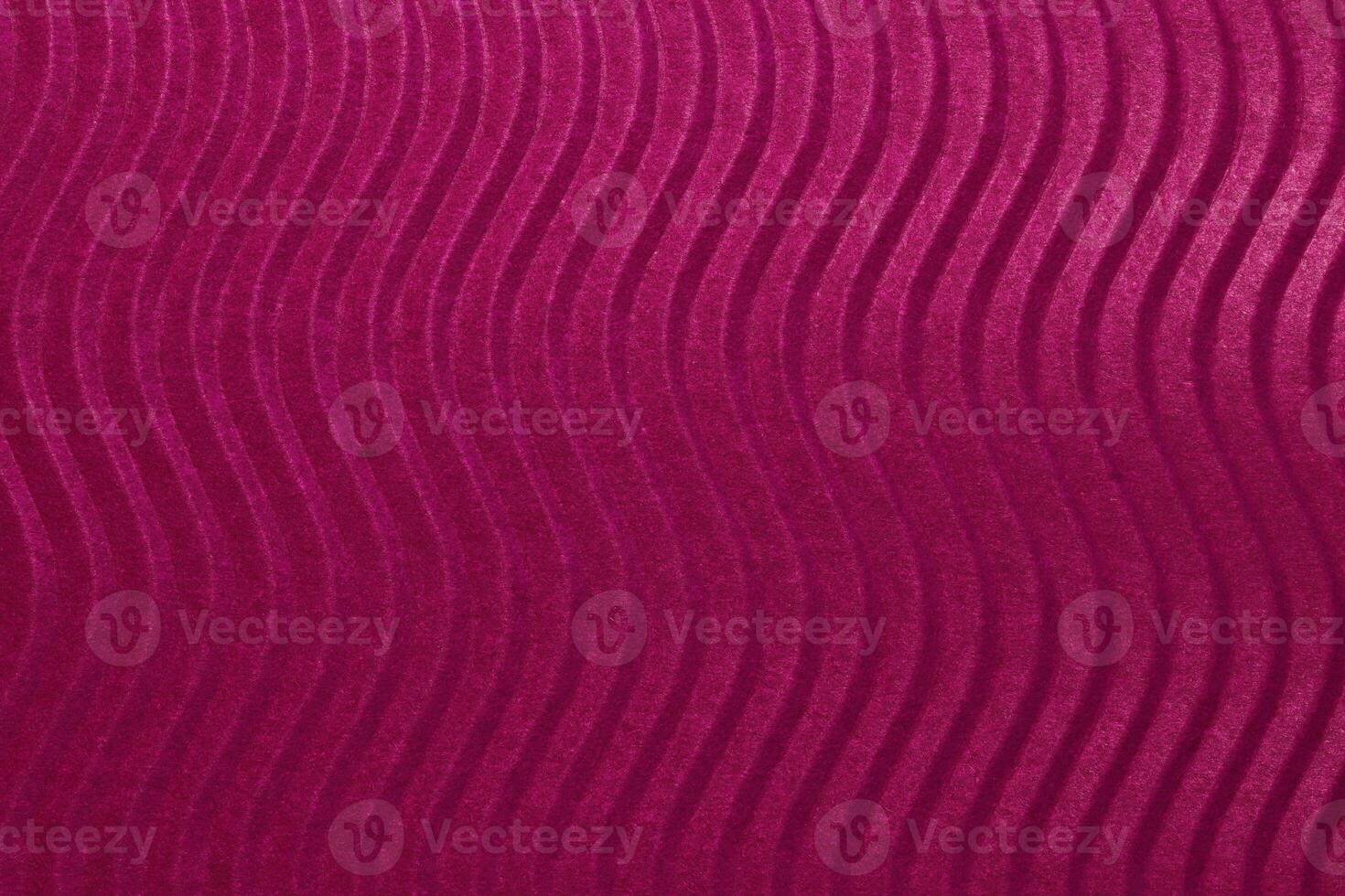 Red Scarlet Paper Vertical Waves Texture. Embossed Waves on Detailed Paper Background. Corrugated Wavy Cardboard Backdrop. photo