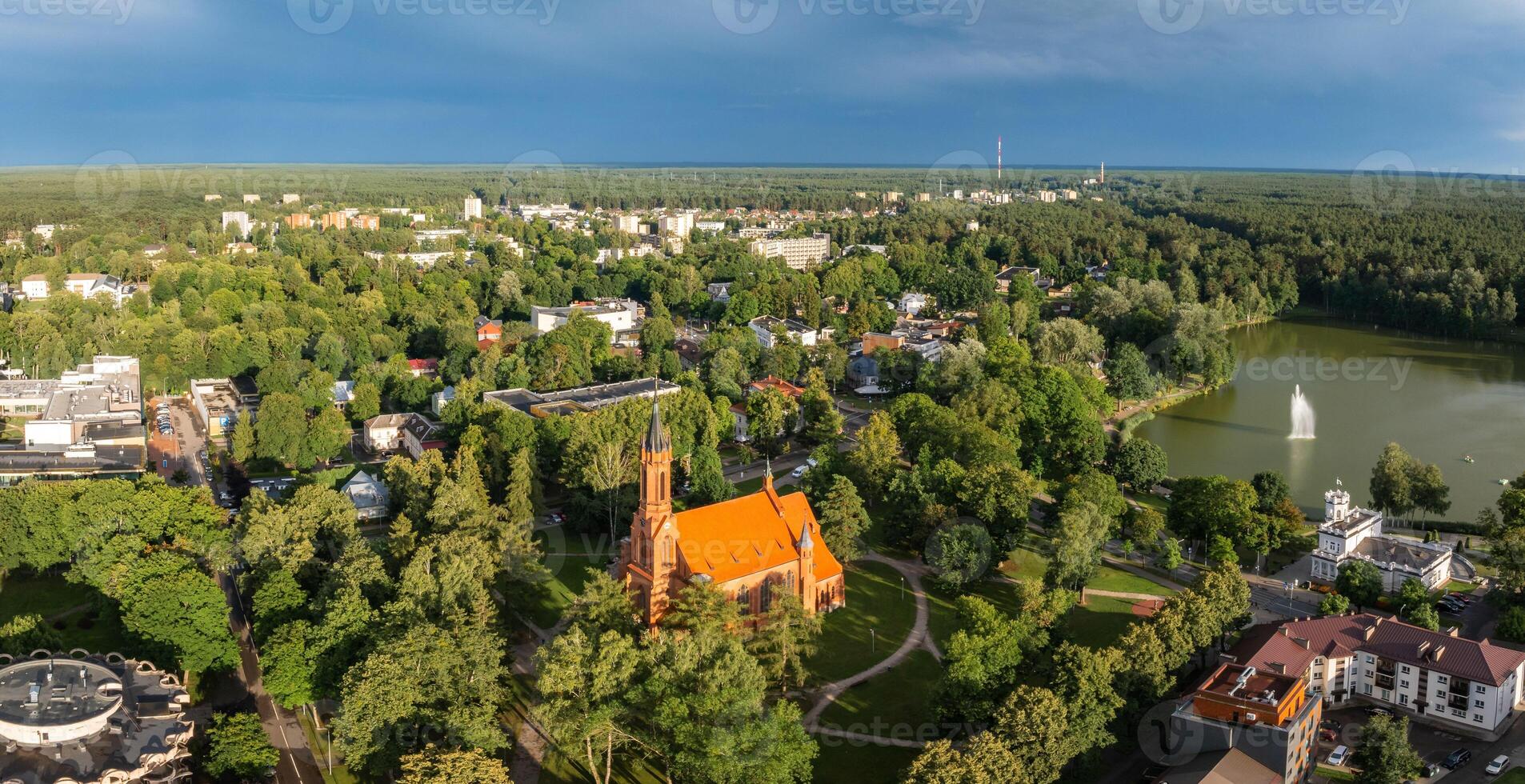 Aerial panoramic view of Lithuanian resort Druskininkai. Druskininkai in autumn colours, drone picture of multi coloured trees in most beautiful city of Druskininkai in Lithuania photo