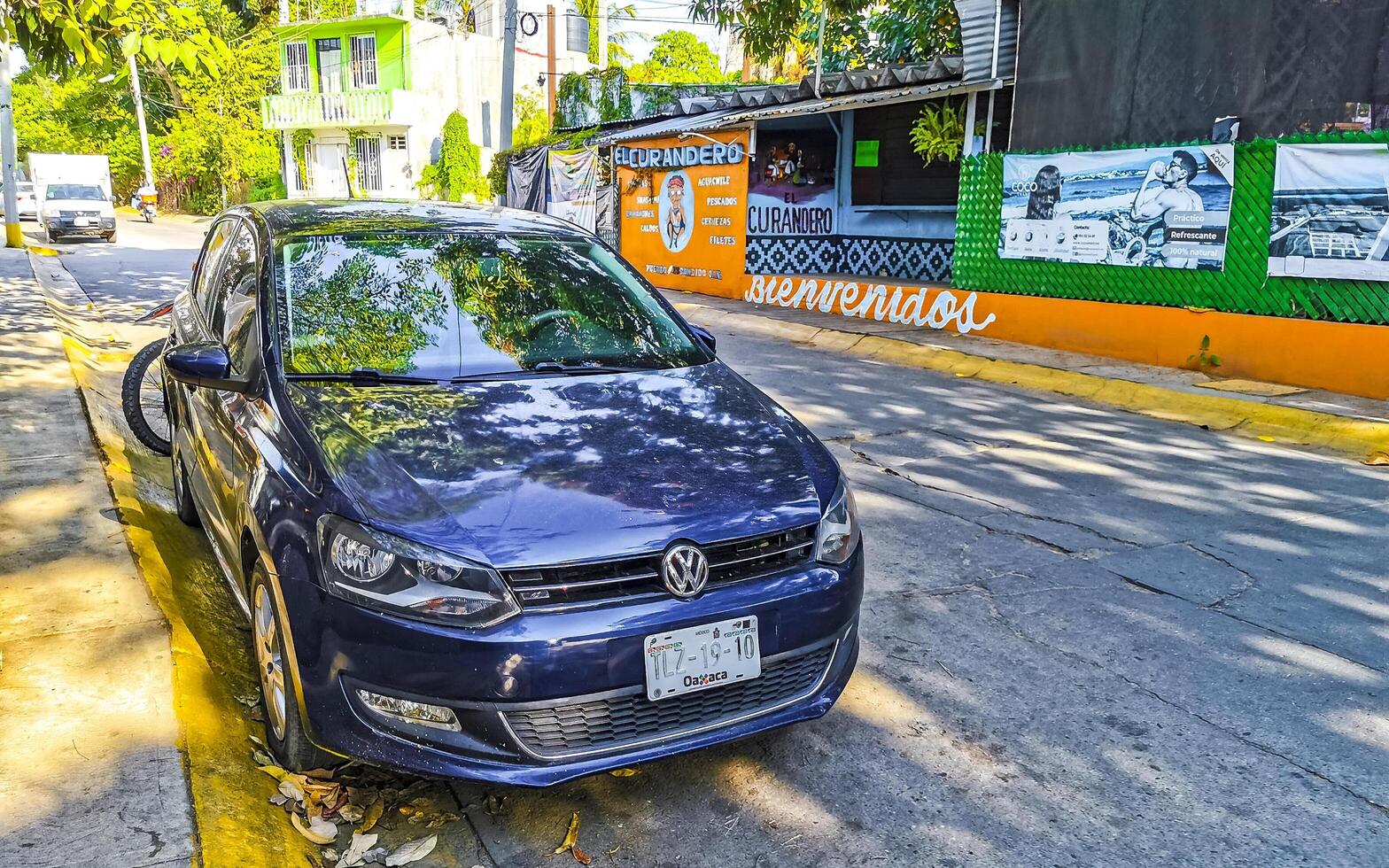 Puerto Escondido Oaxaca Mexico 2023 Dark black blue car vehicle transportation in city town Mexico. photo