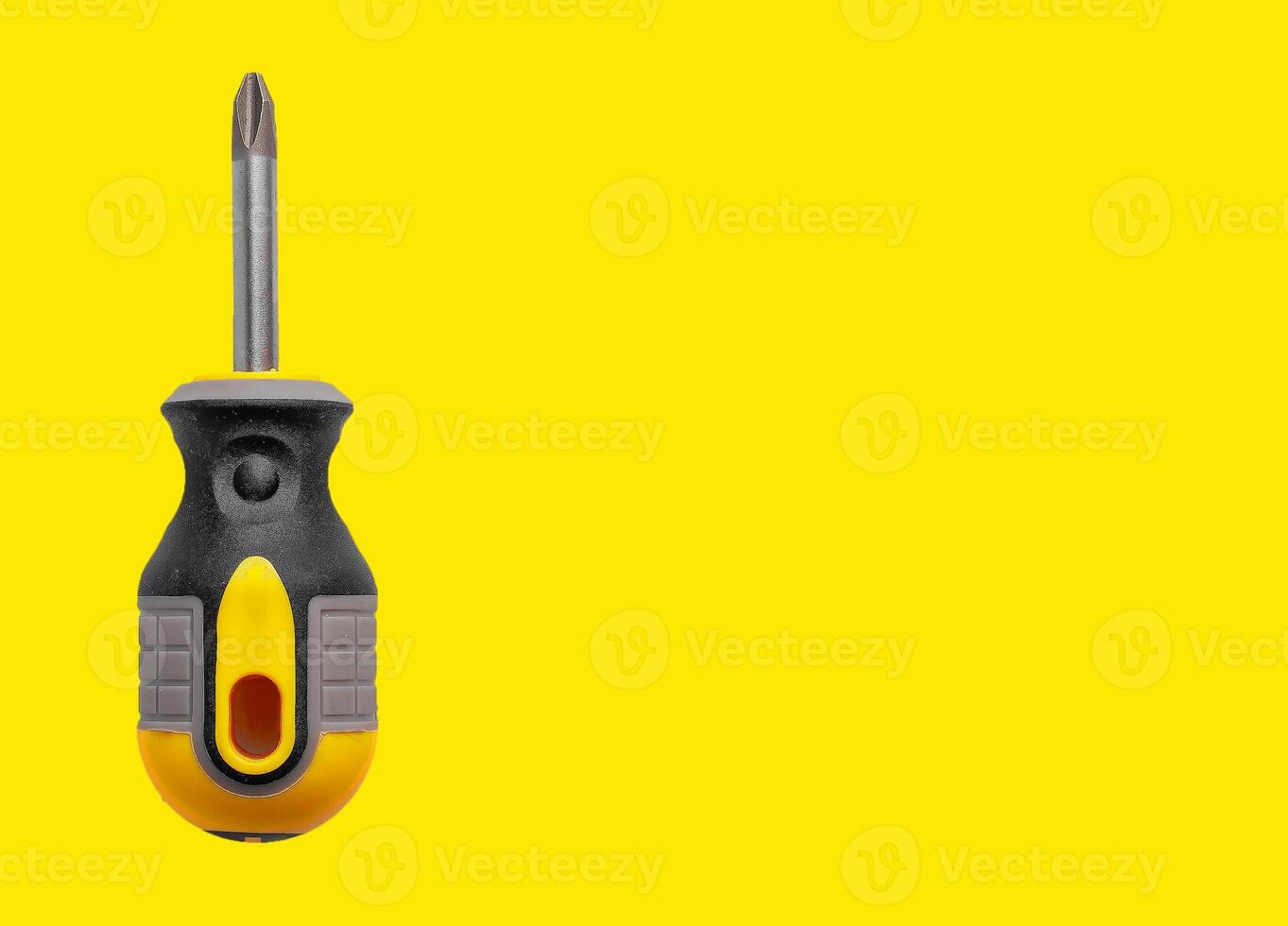 Screwdriver design in minimal background, metal tool and equipment object concept. Pink colorful photo