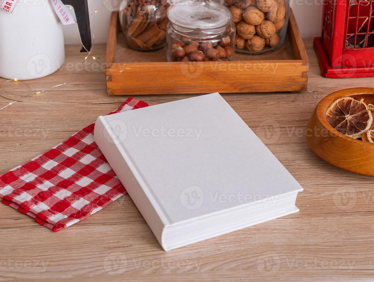 Book mockup in kitchen, cook table with recipe background. Top view cookbook food cover. Empty above photo
