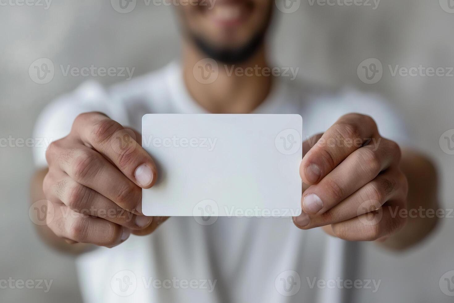 A blank white bank card or business card in the hands of a man close-up. Generated by artificial intelligence photo