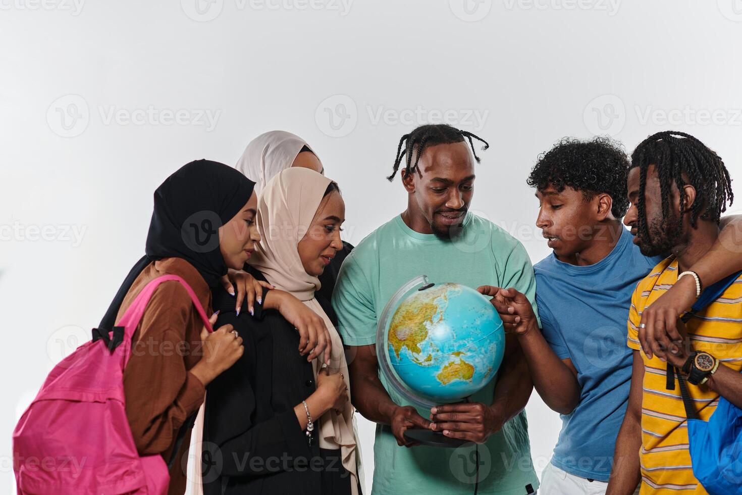 A diverse group of students is gathered around a globe, engrossed in exploration and study, their vibrant energy captured against a pristine white background, symbolizing unity and curiosity in their photo