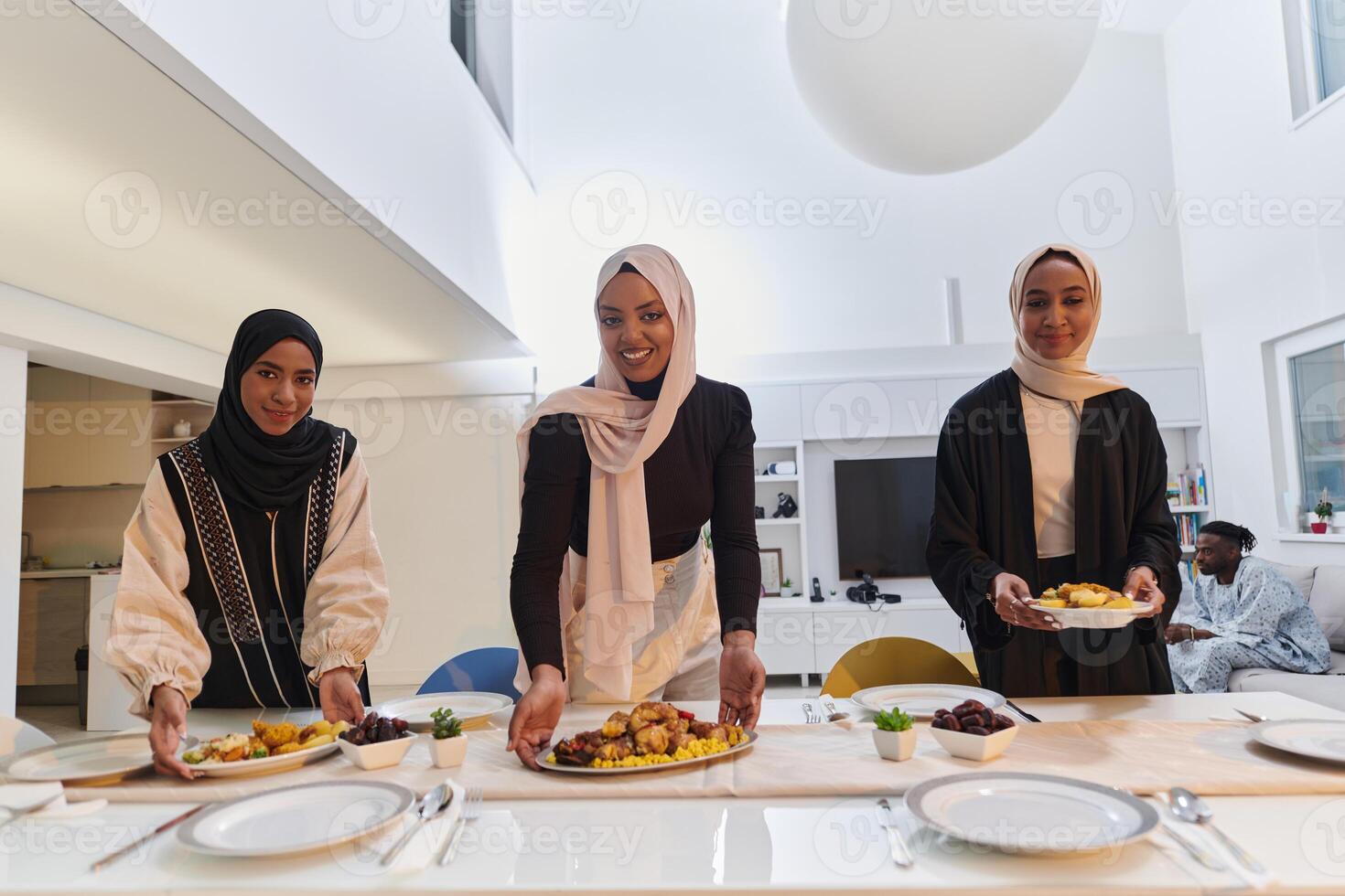 Group of young Arab women come together to lovingly prepare an iftar table during the sacred Muslim month of Ramadan, embodying the essence of communal unity, cultural tradition, and joyous photo
