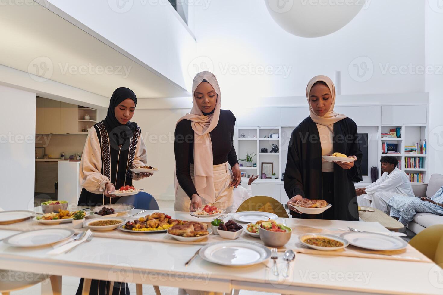 Group of young Arab women come together to lovingly prepare an iftar table during the sacred Muslim month of Ramadan, embodying the essence of communal unity, cultural tradition, and joyous photo