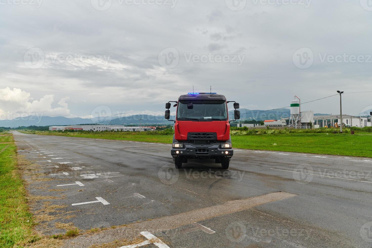 In this captivating scene, a state-of-the-art firetruck, equipped with advanced rescue technology, stands ready with its skilled firefighting team, prepared to intervene and respond rapidly to photo