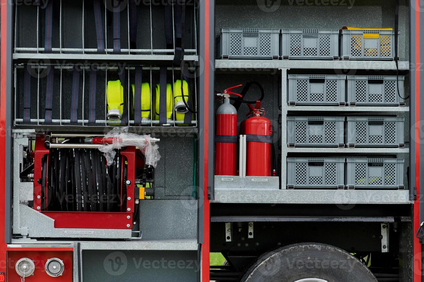 In this detailed close-up, a high-tech rescue tool, meticulously organized within state-of-the-art firefighting vehicles, showcases precision and innovation in life-saving equipment, emphasizing the photo