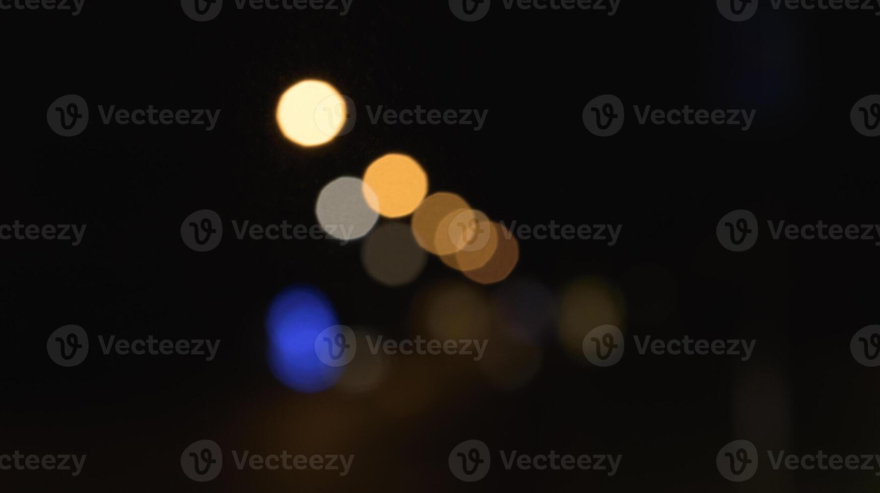 Lights on the street in the night blurred. Copy space. photo