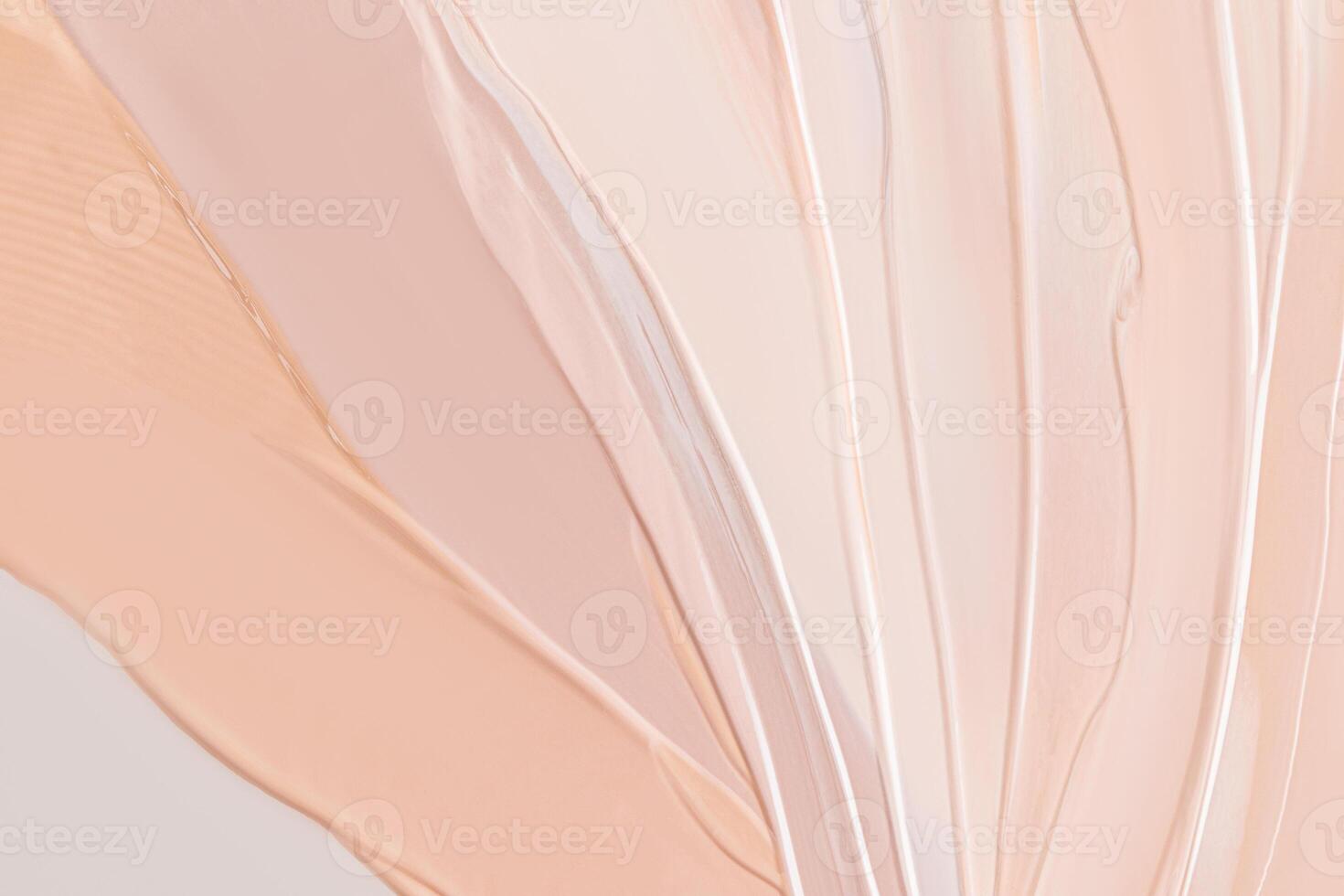 A chic cosmetic background of several strokes of liquid foundation powder of different tones. Delicate texture of foundation powder. layout for design photo