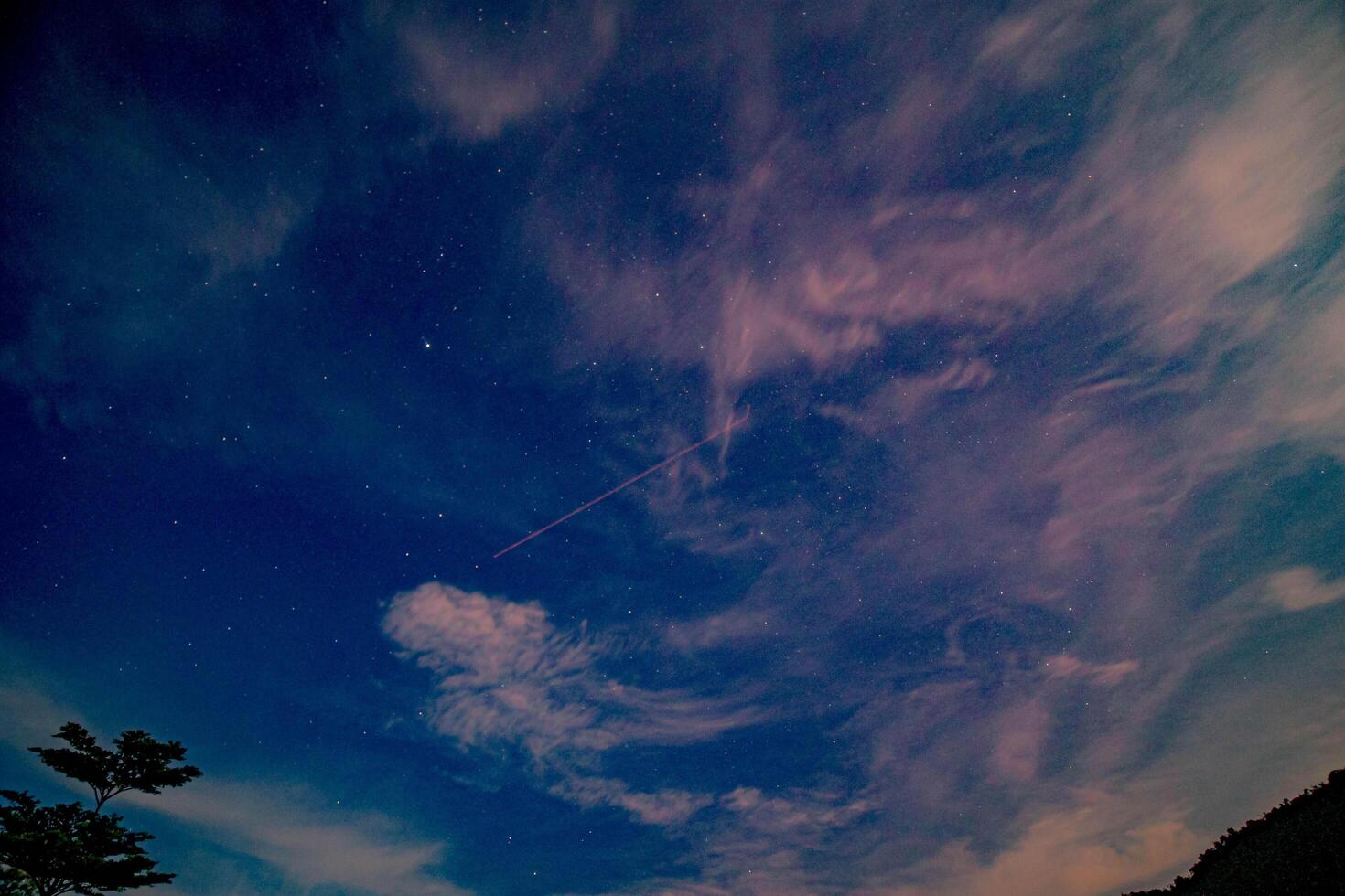 Beautiful Summer Sunset with Dramatic Clouds and starry night. photo