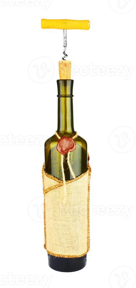 Corkscrew on a wine bottle photo