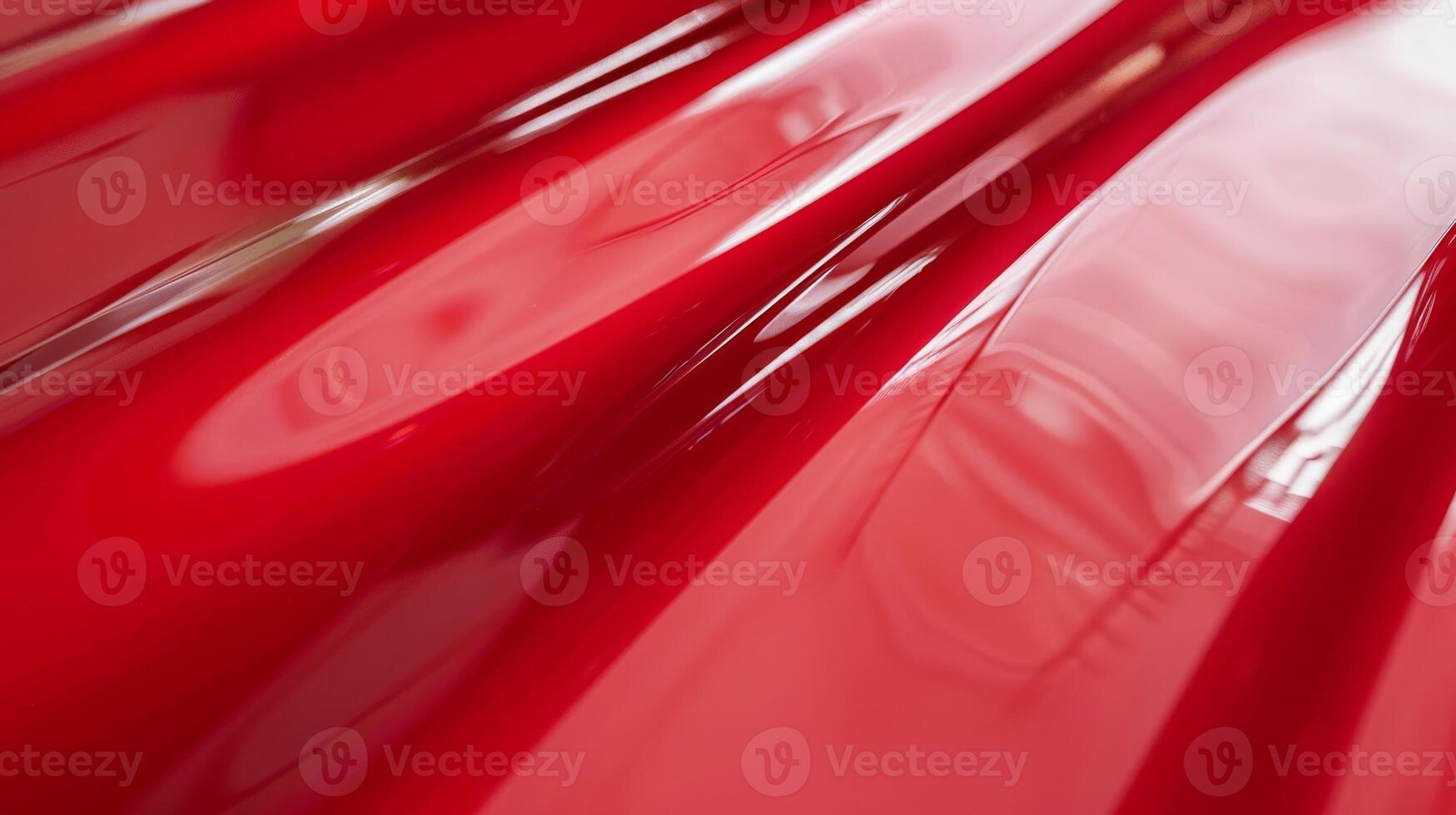 Close-Up of Shiny Red Plastic Surface, Abstract Background for Design, Typography, or Artistic Projects photo