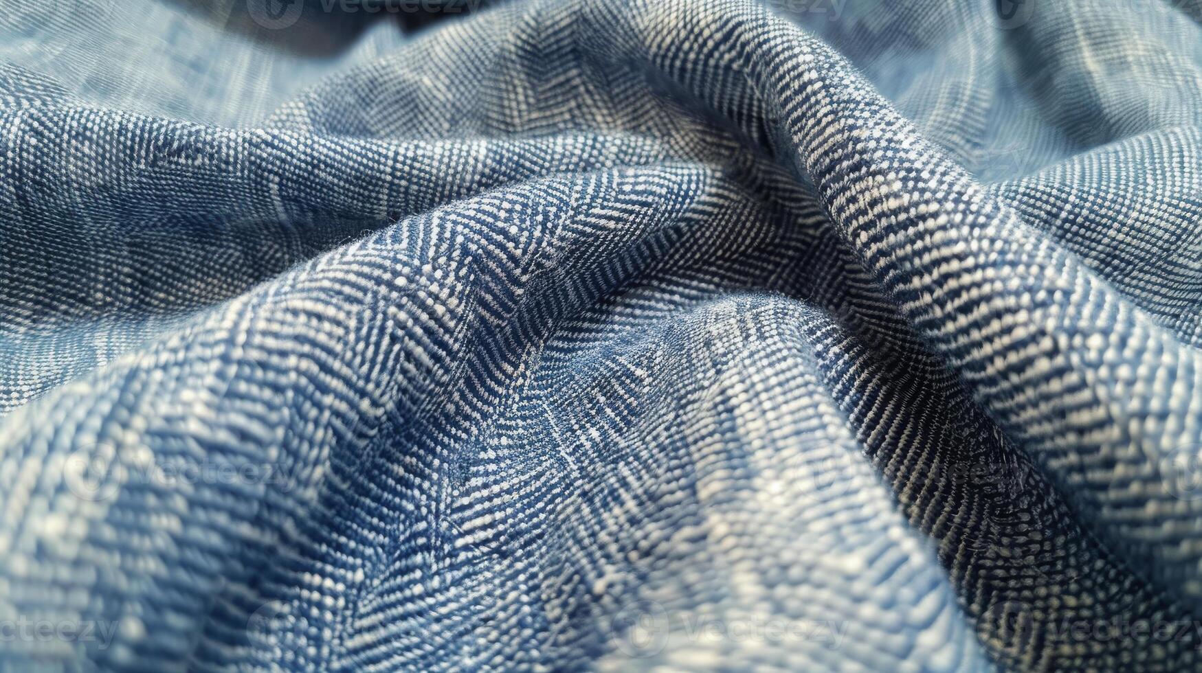Close-Up View of Blue Denim Fabric with Intricate Woven Texture for Design and Textiles photo