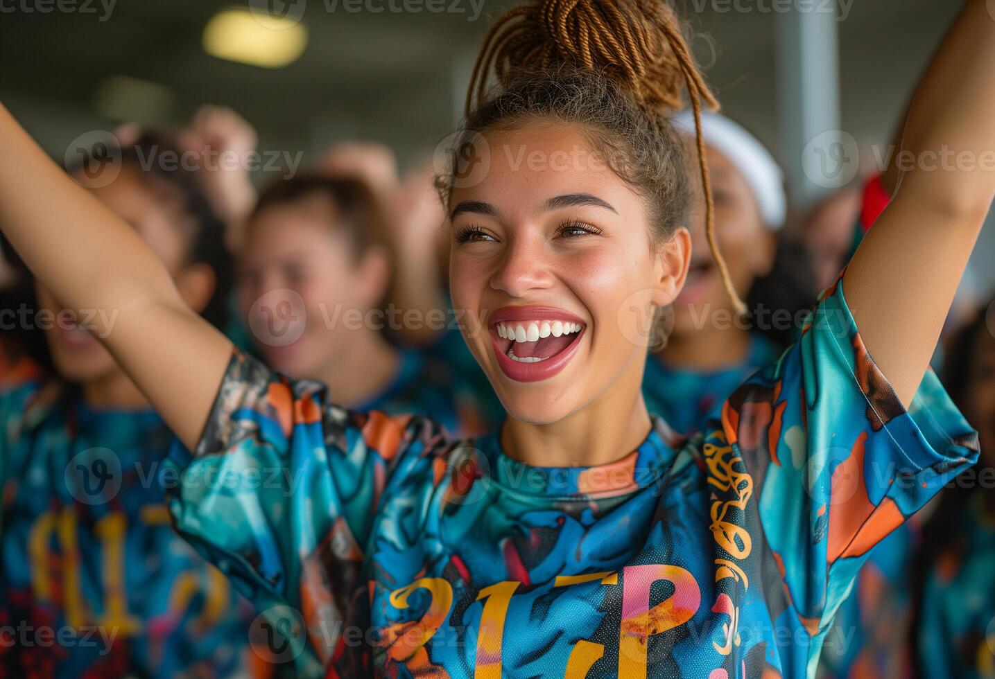 A group of happy soccer women teammates cheering in the stadium photo