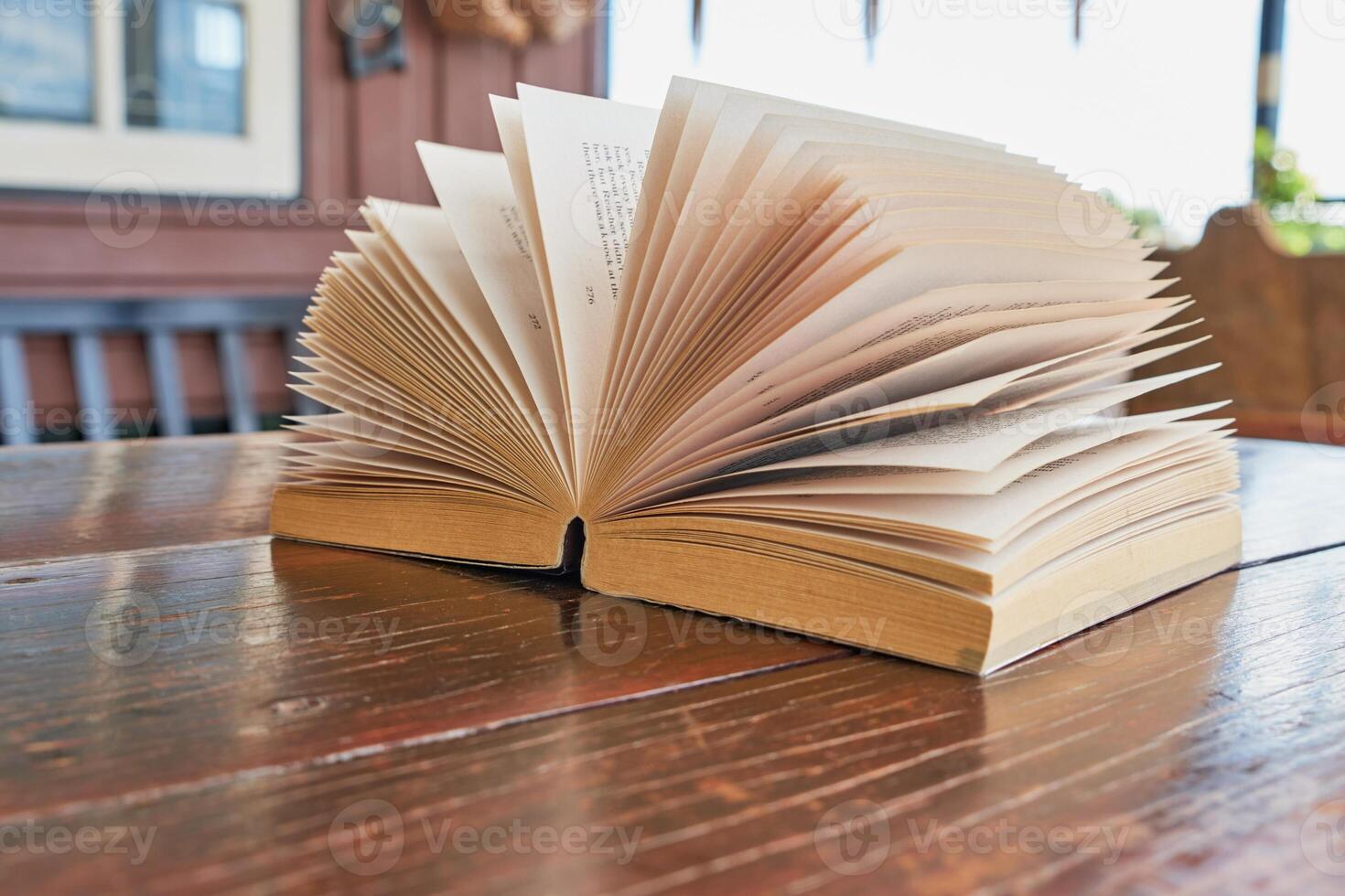 Open books on the table photo