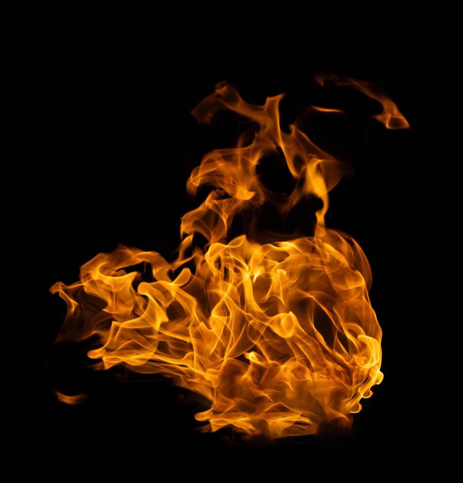 Fire and burning flame of explosive fireball isolated on dark background for abstract graphic design concept photo