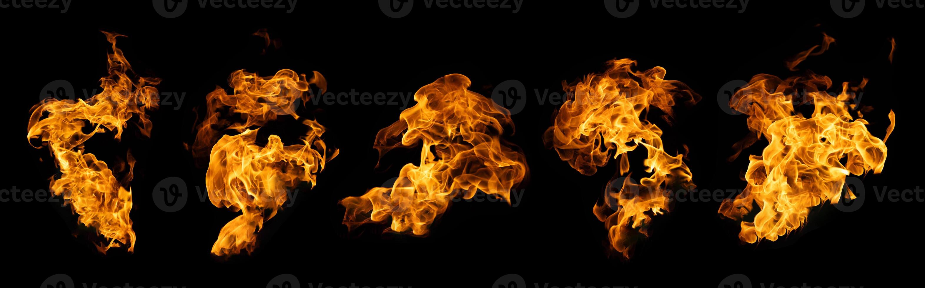 The set of fire and burning flame isolated on dark background for graphic design photo