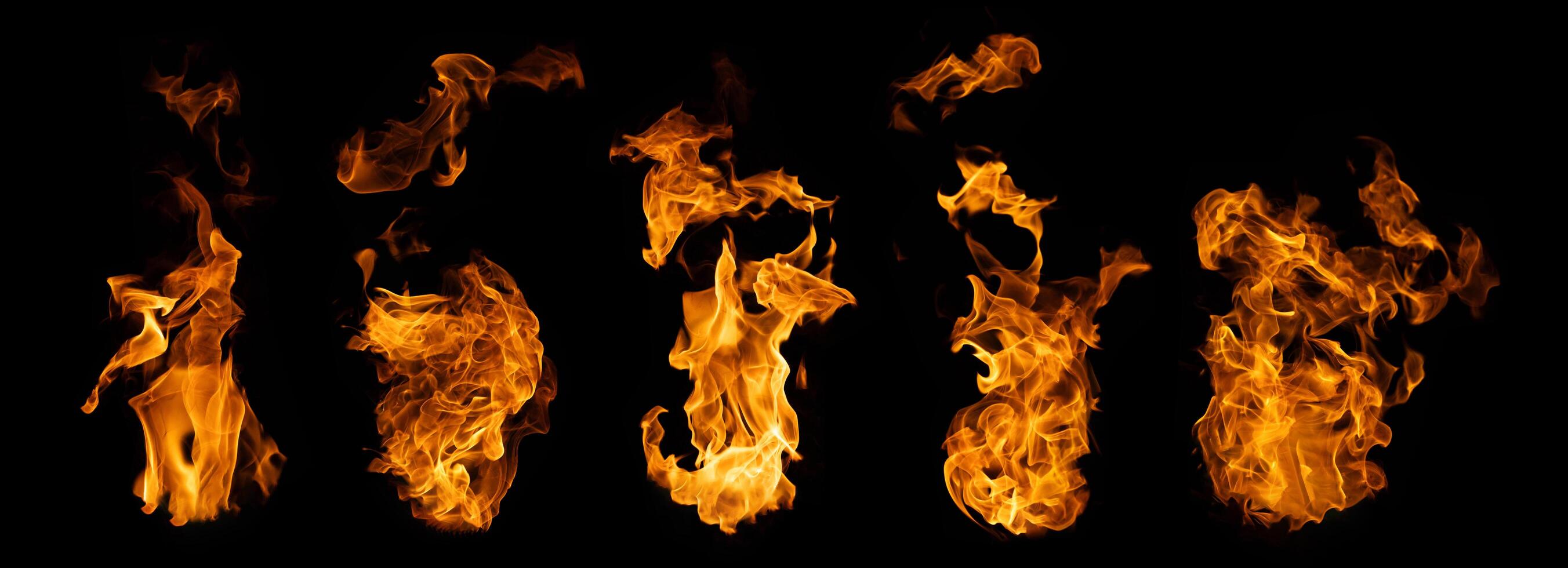 The set of fire and burning flame isolated on dark background for graphic design photo