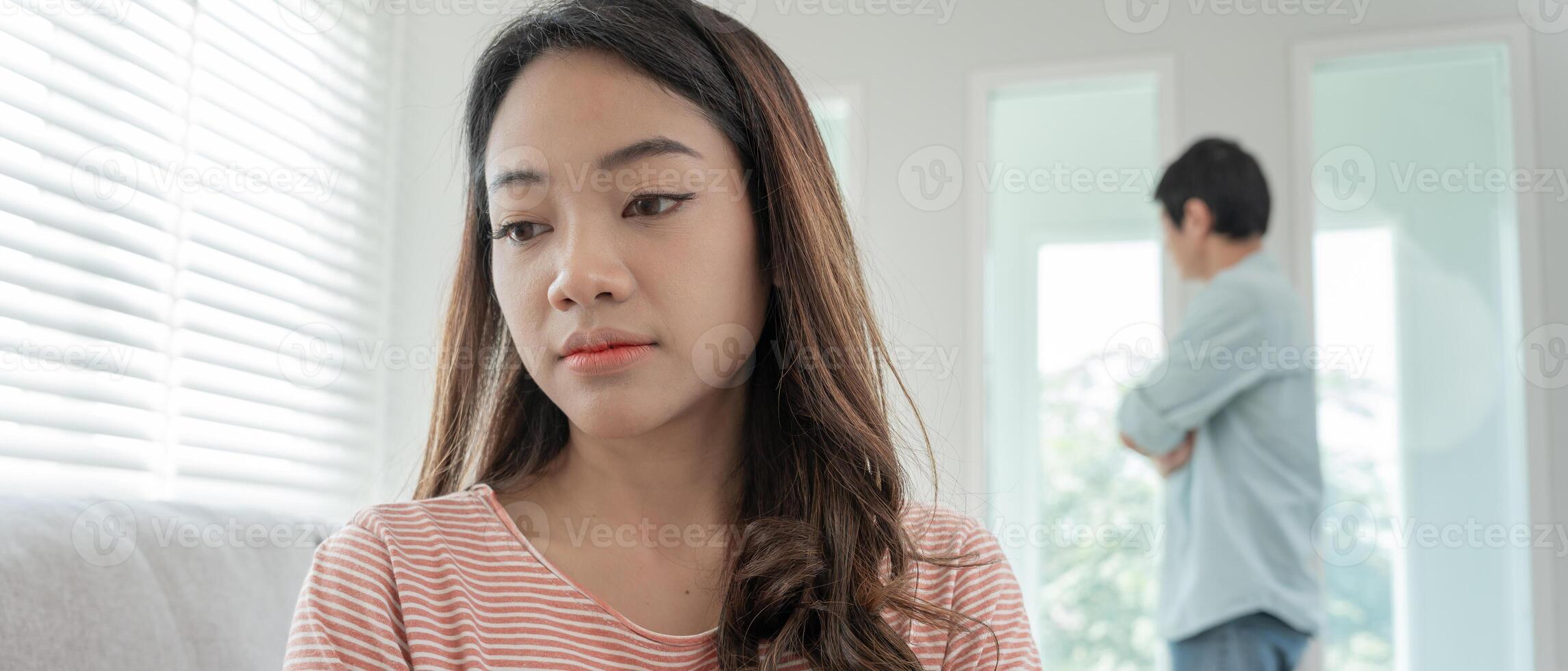 Divorce. Asian couples are desperate and disappointed after marriage. Husband and wife are sad, upset and frustrated after quarrels. distrust, love problems, betrayals. family problem, teenage love photo