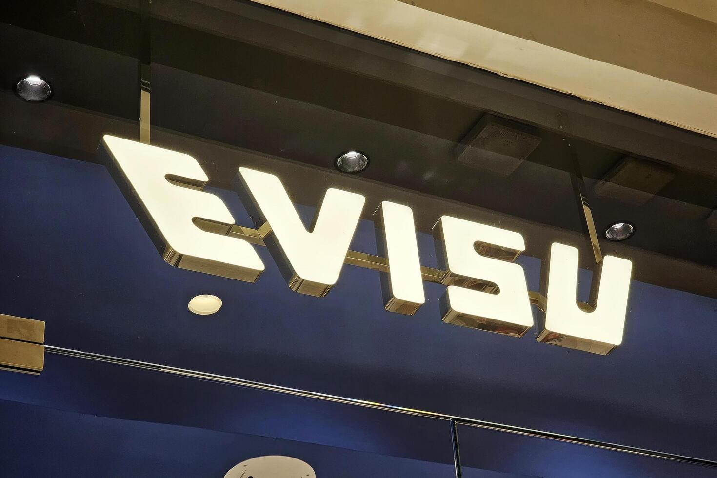 Bangkok, Thailand June 06, 2024 Evisu sign. Evisu is a famous Japanese designer clothing company that was founded in 1991 in Osaka, Japan. photo