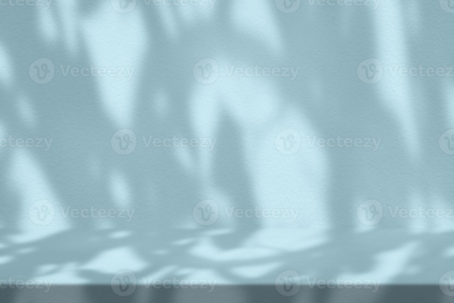 Light Cyan Stucco Table with Nature Shadow on Concrete Wall Texture Background photo