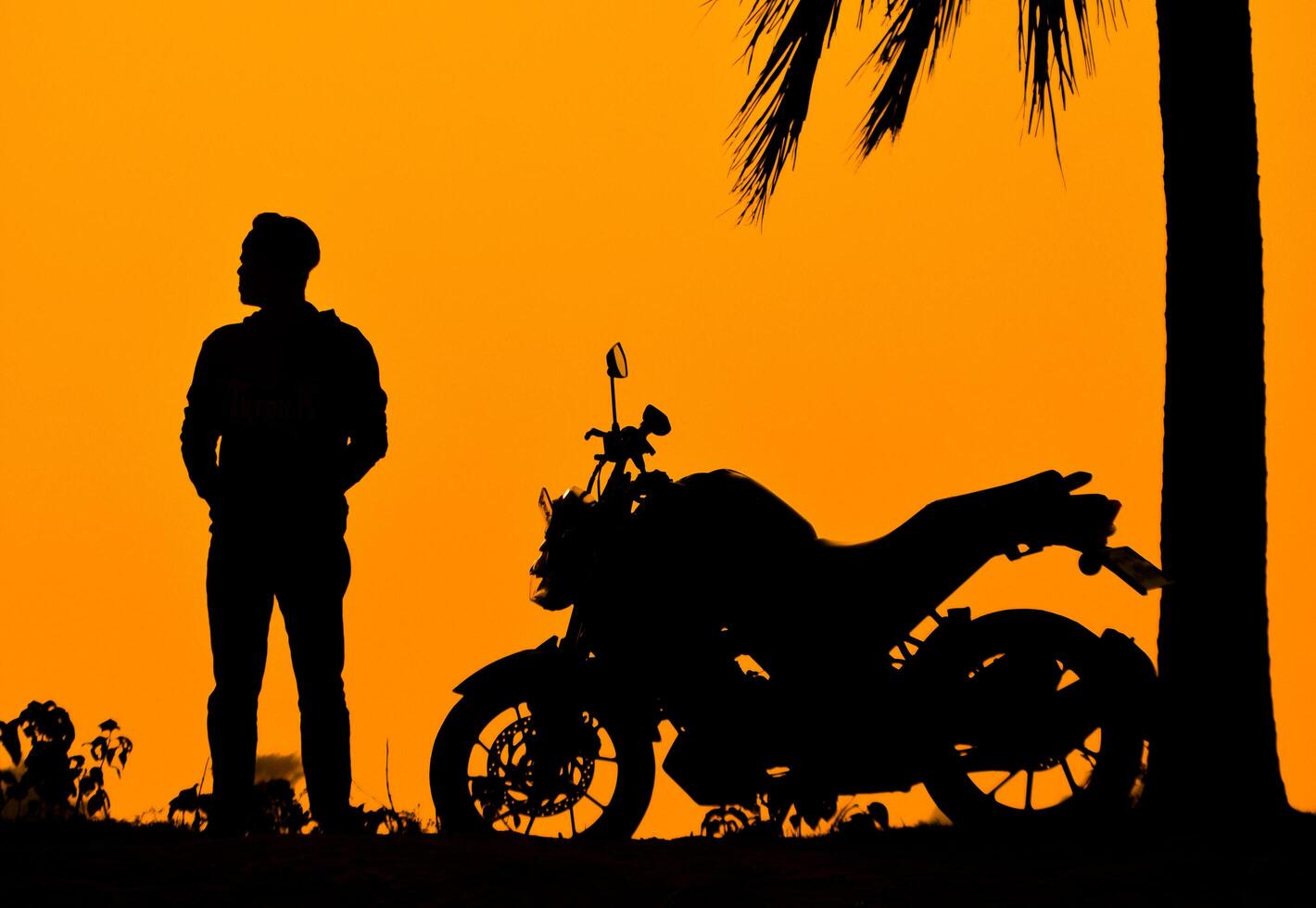 A man with a bike photo