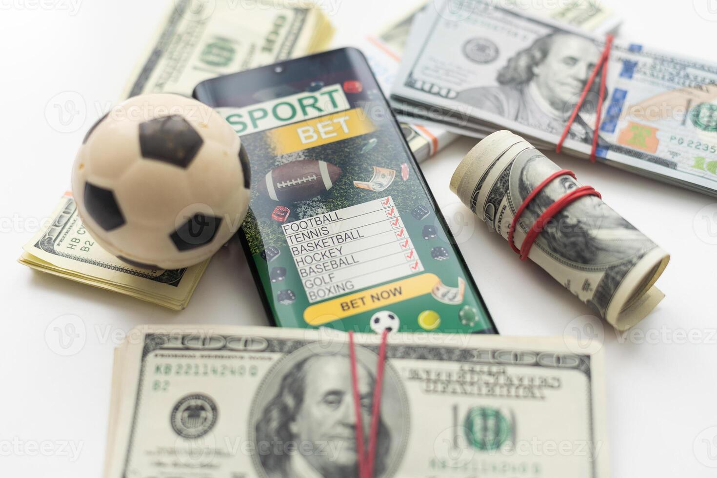 tablet pc with app for sport bets, on top of stacks of banknotes, white background, concept of online bets 3d render photo