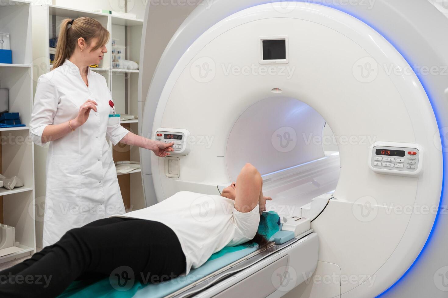 Medical CT or MRI Scan in the modern hospital laboratory. Interior of radiography department. Technologically advanced equipment in white room. Magnetic resonance diagnostics machine photo