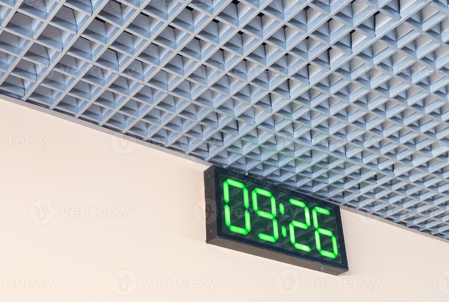 Digital clock in airport terminal. photo